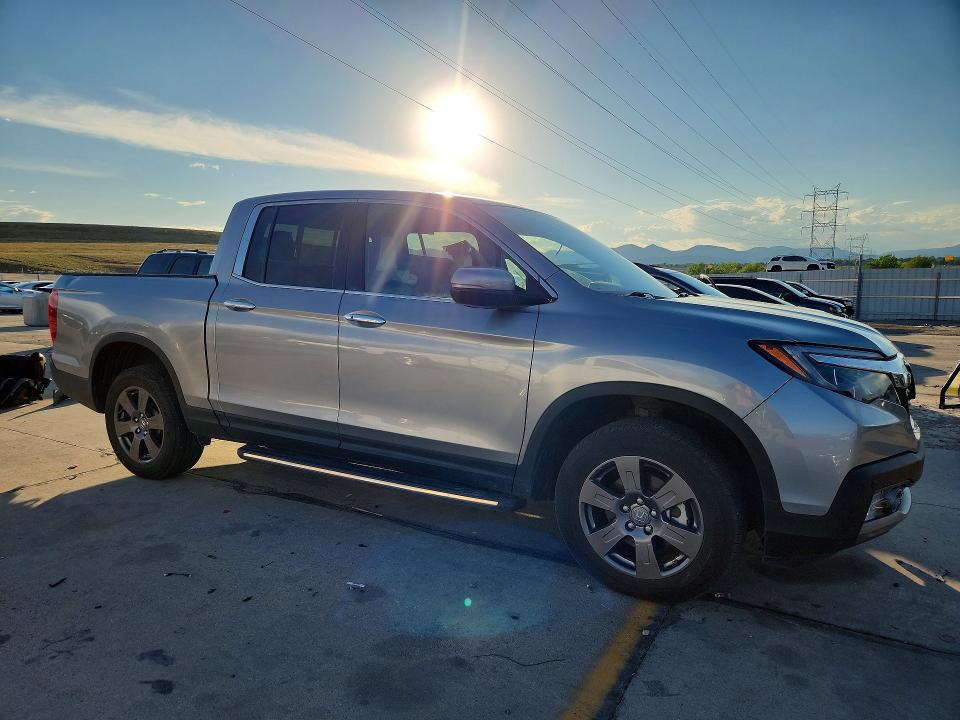 Photo 4 from auction – 2020 HONDA RIDGELINE with VIN 5FPYK3F70LB016991