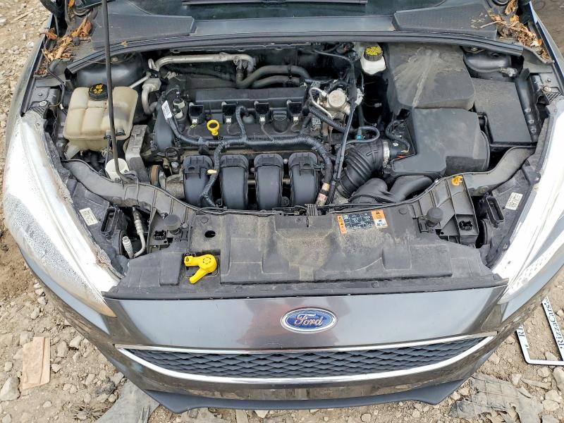 Photo 11 from auction – 2018 FORD FOCUS with VIN 1FADP3F20JL266793