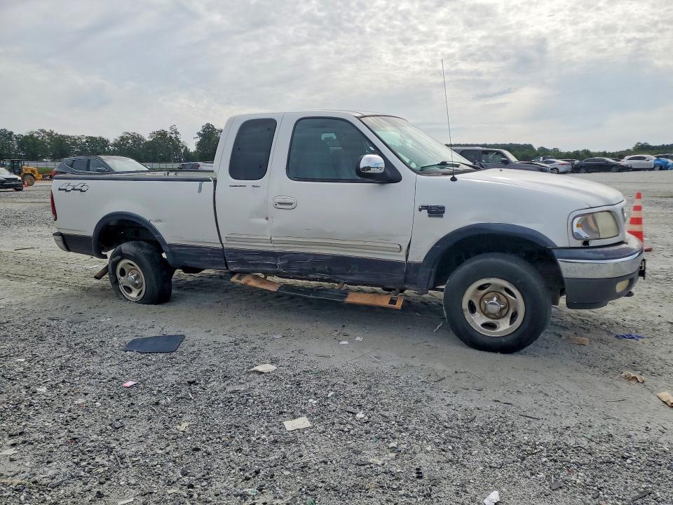 Photo 4 from auction – 1999 FORD F150 with VIN 1FTRX18LXXNC06379