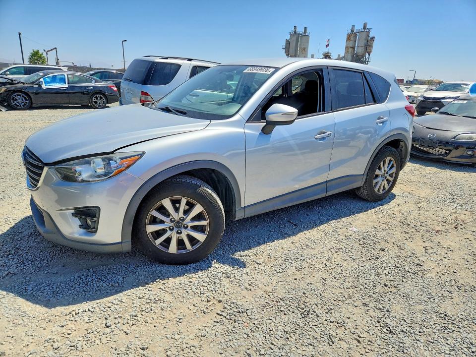 MAZDA CX-5 2016 with VIN JM3KE2CY9G0862030 - Photo from auction