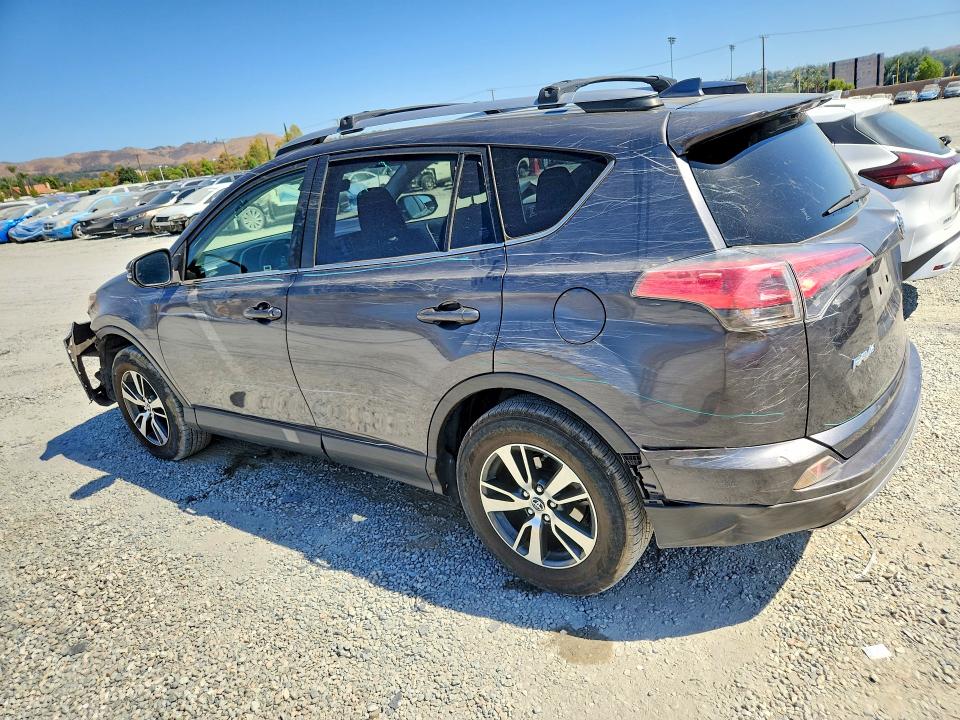 Photo 2 from auction – 2018 TOYOTA RAV4 with VIN JTMWFREV0JJ173899