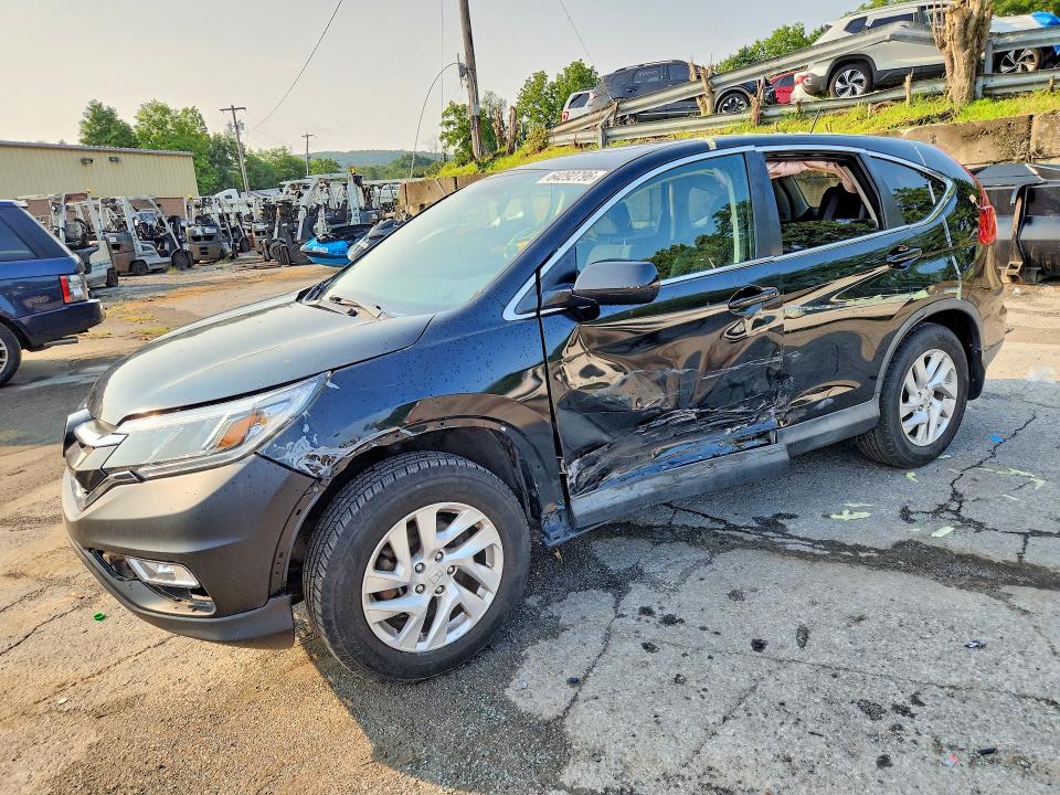HONDA CR-V 2015 with VIN 2HKRM3H57FH519247 - Photo from auction