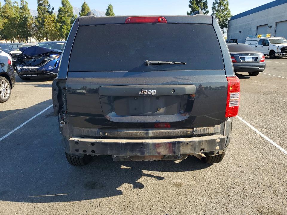 Photo 6 from auction – 2014 JEEP PATRIOT with VIN 1C4NJPBAXED529389