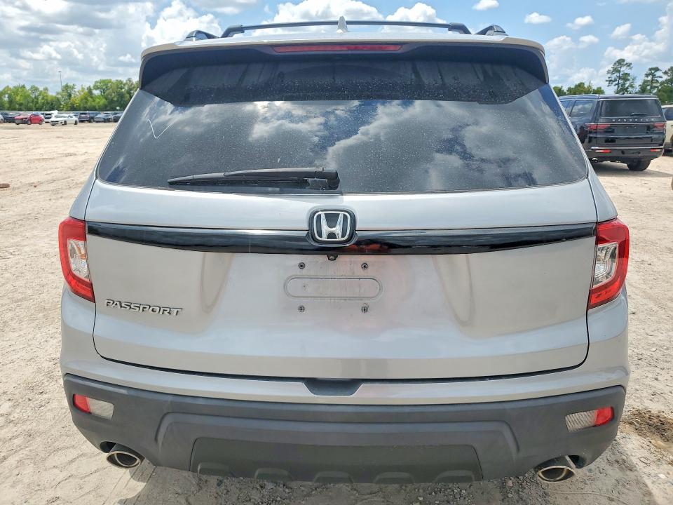 Photo 6 from auction – 2021 HONDA PASSPORT with VIN 5FNYF7H22MB009516