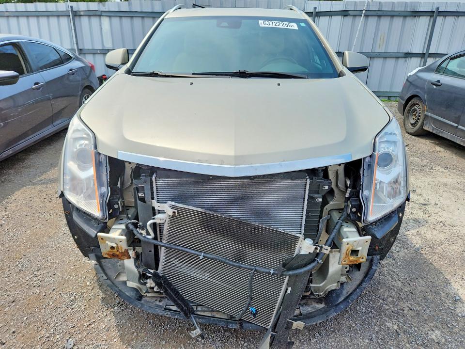 Photo 5 from auction – 2014 CADILLAC SRX with VIN 3GYFNEE35ES584692