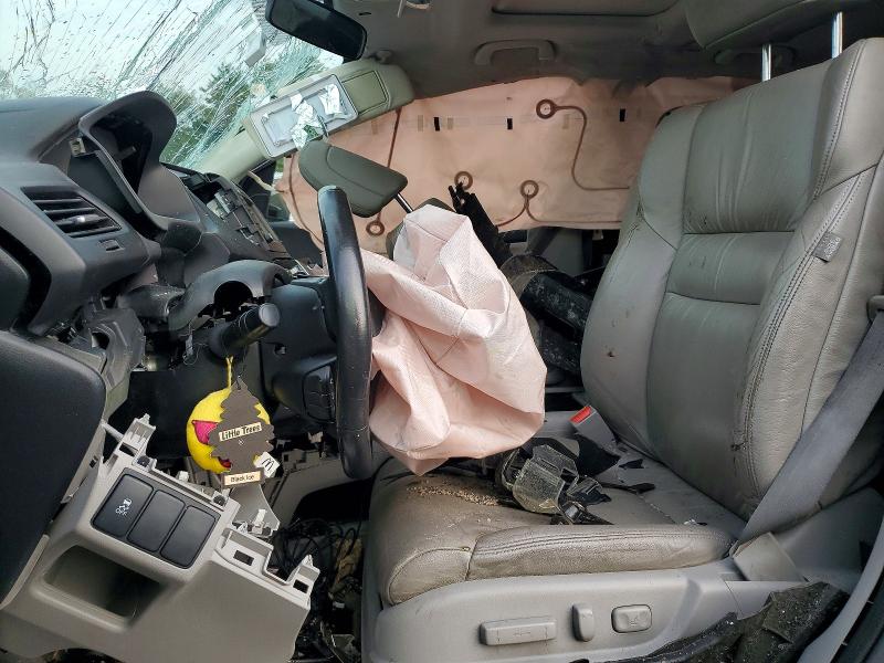 Photo 7 from auction – 2012 HONDA CR-V with VIN JHLRM4H77CC021471