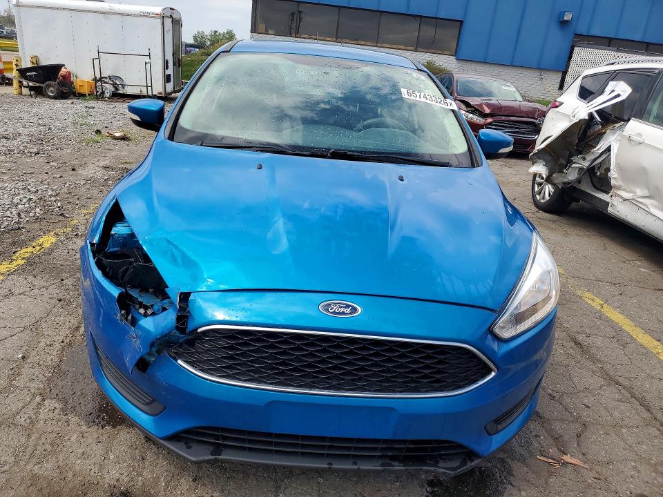 Photo 5 from auction – 2016 FORD FOCUS with VIN 1FADP3F29GL398296