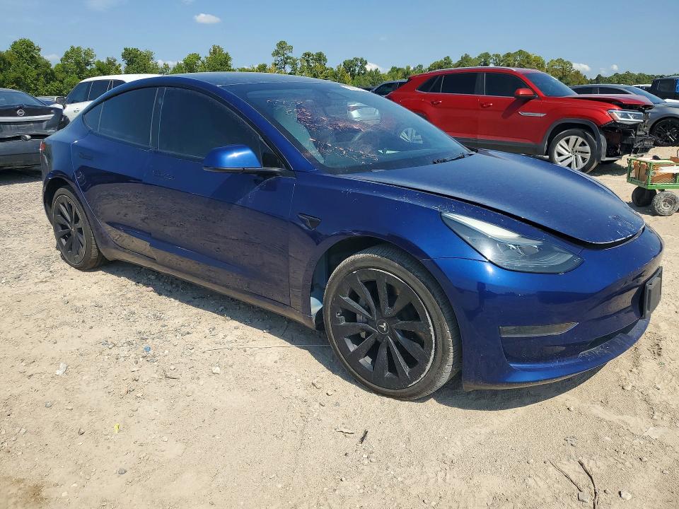 Снимка 4 от търг – 2023 TESLA MODEL 3 с VIN 5YJ3E1EAXPF396729