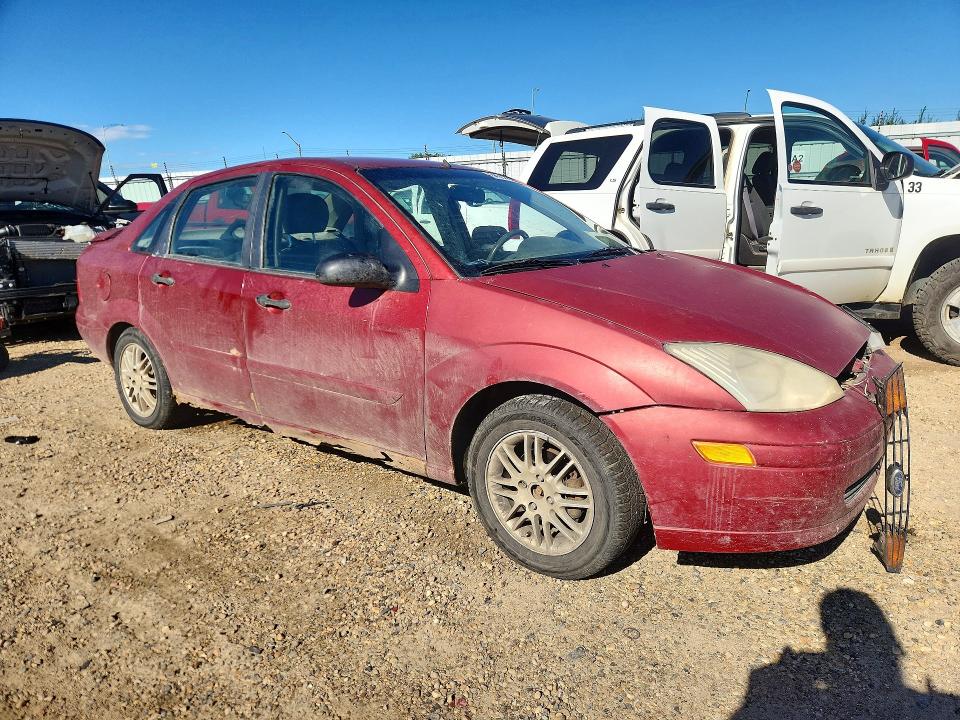 Photo 4 from auction – 2000 FORD FOCUS with VIN 1FAFP3836YW179097