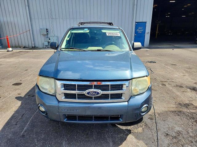 Photo 5 from auction – 2011 FORD ESCAPE with VIN 1FMCU0DGXBKB82544