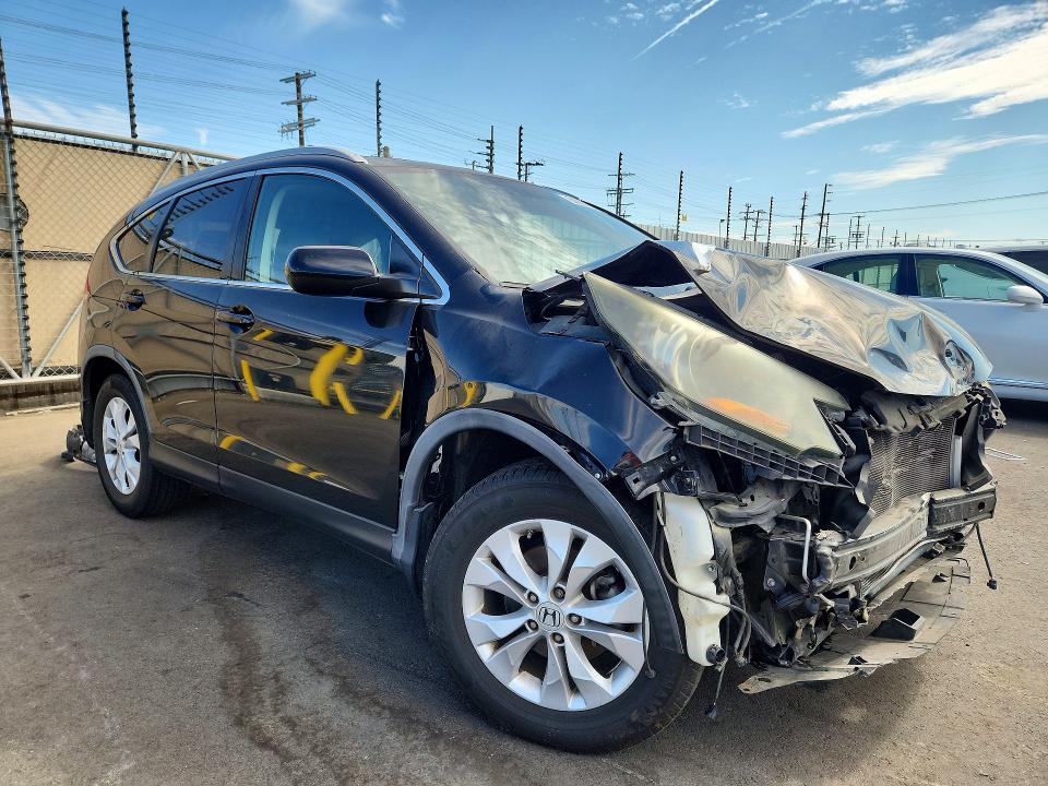 Photo 4 from auction – 2012 HONDA CR-V with VIN 2HKRM3H73CH510381