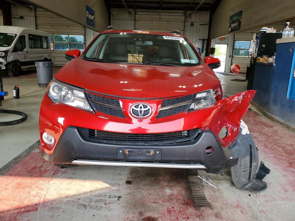 Photo 5 from auction – 2014 TOYOTA RAV4 with VIN JTMDFREV7ED069020