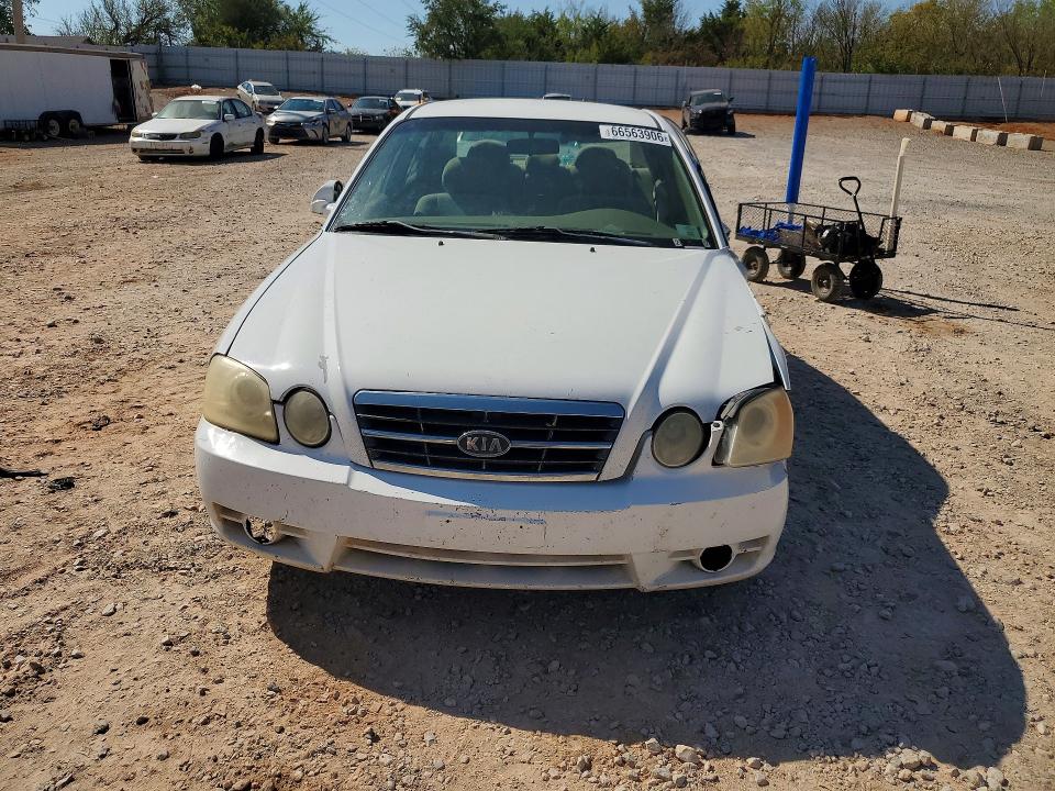 Photo 5 from auction – 2004 KIA OPTIMA with VIN KNAGD126145318693