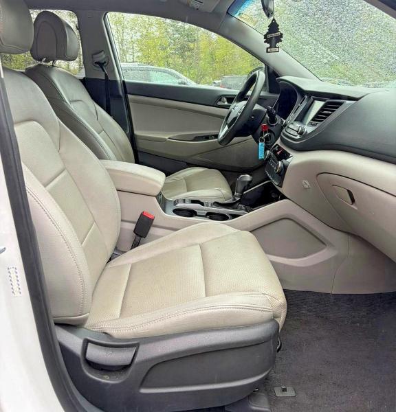 Photo 5 from auction – 2018 HYUNDAI TUCSON with VIN KM8J3CA41JU714885