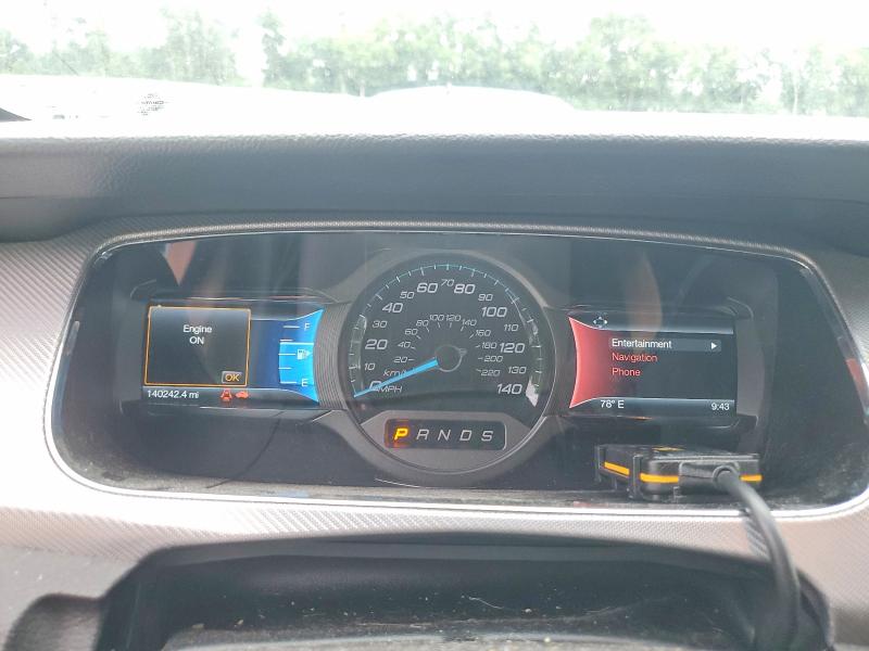 Photo 9 from auction – 2015 FORD TAURUS with VIN 1FAHP2KT3FG137425