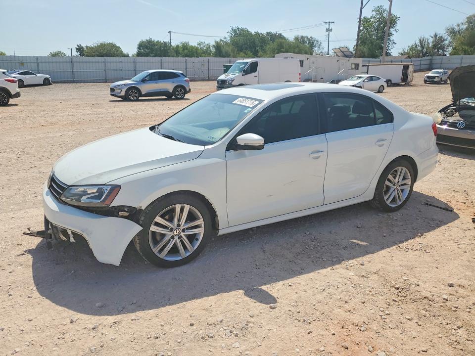VOLKSWAGEN JETTA 2015 with VIN 3VWLA7AJ6FM203696 - Photo from auction
