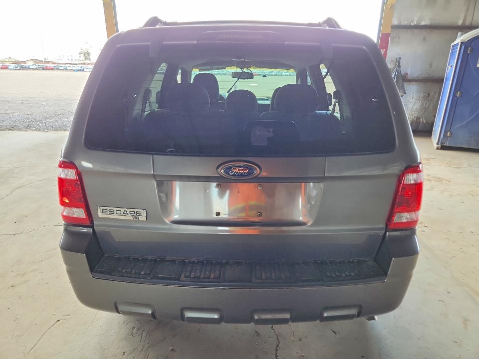 Photo 6 from auction – 2009 FORD ESCAPE with VIN 1FMCU03749KA08724