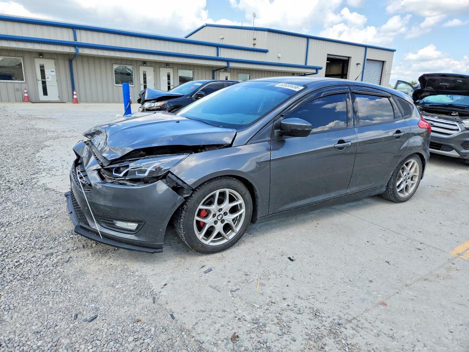 FORD FOCUS 2015 with VIN 1FADP3K20FL386624 - Photo from auction