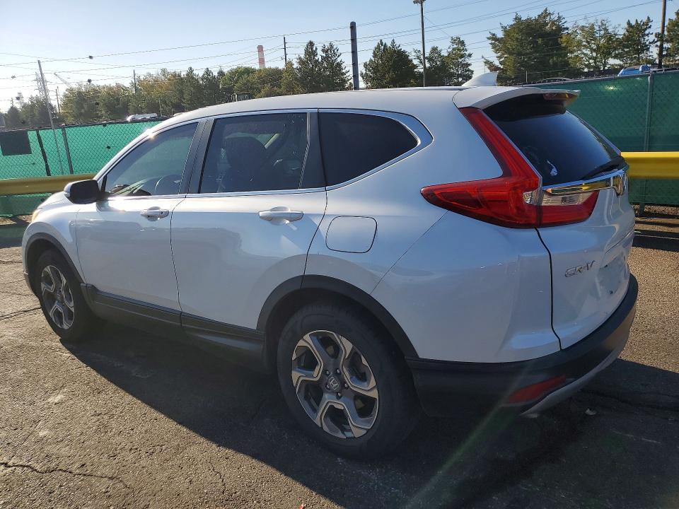 Photo 2 from auction – 2019 HONDA CR-V with VIN JHLRW2H89KX013046