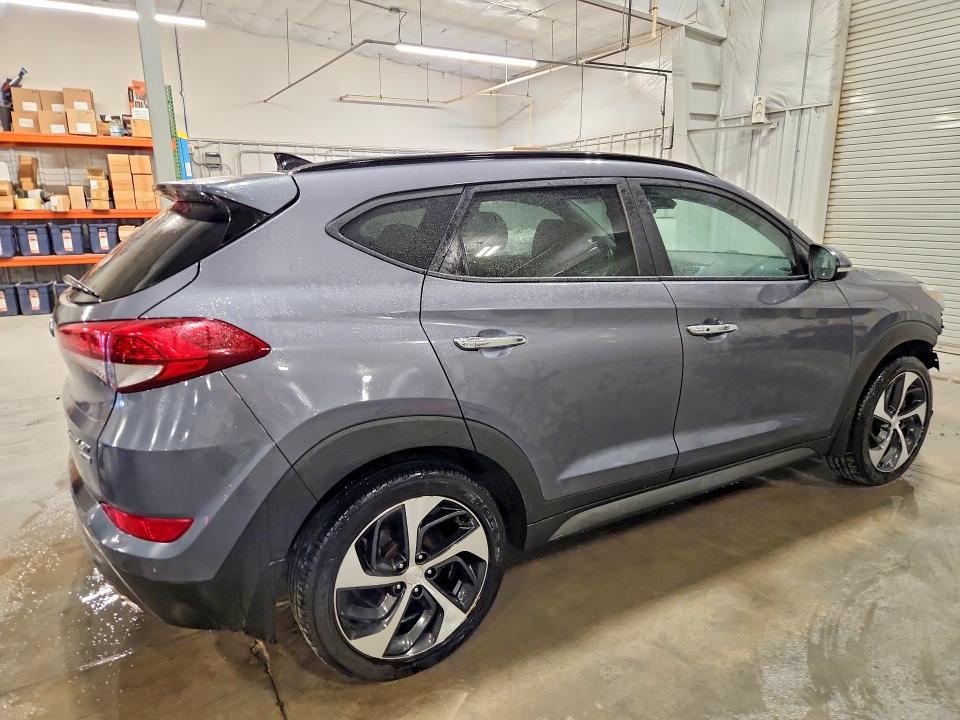 Photo 3 from auction – 2016 HYUNDAI TUCSON with VIN KM8J3CA24GU220687