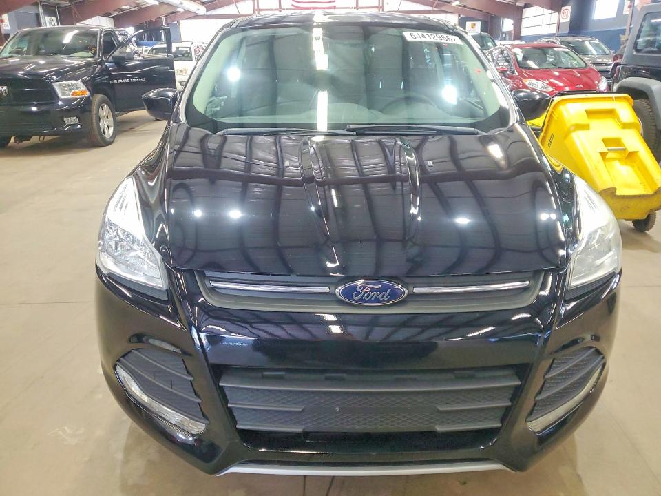 Photo 5 from auction – 2016 FORD ESCAPE with VIN 1FMCU9GX6GUA34208
