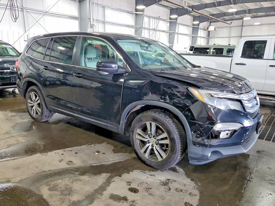 Photo 4 from auction – 2016 HONDA PILOT with VIN 5FNYF6H57GB067503