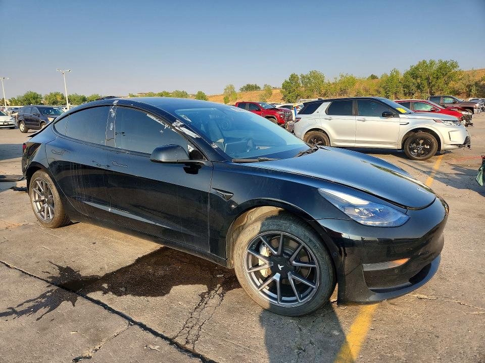 Photo 4 from auction – 2022 TESLA MODEL 3 with VIN 5YJ3E1EA9NF186734