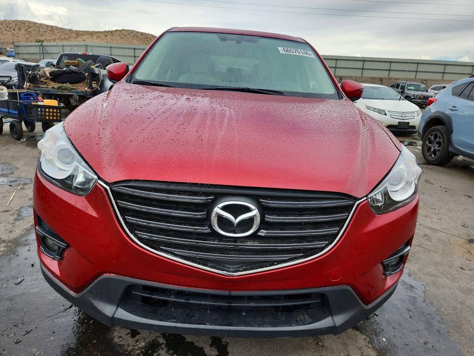 Photo 5 from auction – 2016 MAZDA CX-5 with VIN JM3KE4DY4G0828328