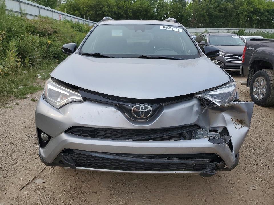 Photo 5 from auction – 2018 TOYOTA RAV4 with VIN JTMJFREV9JJ240378