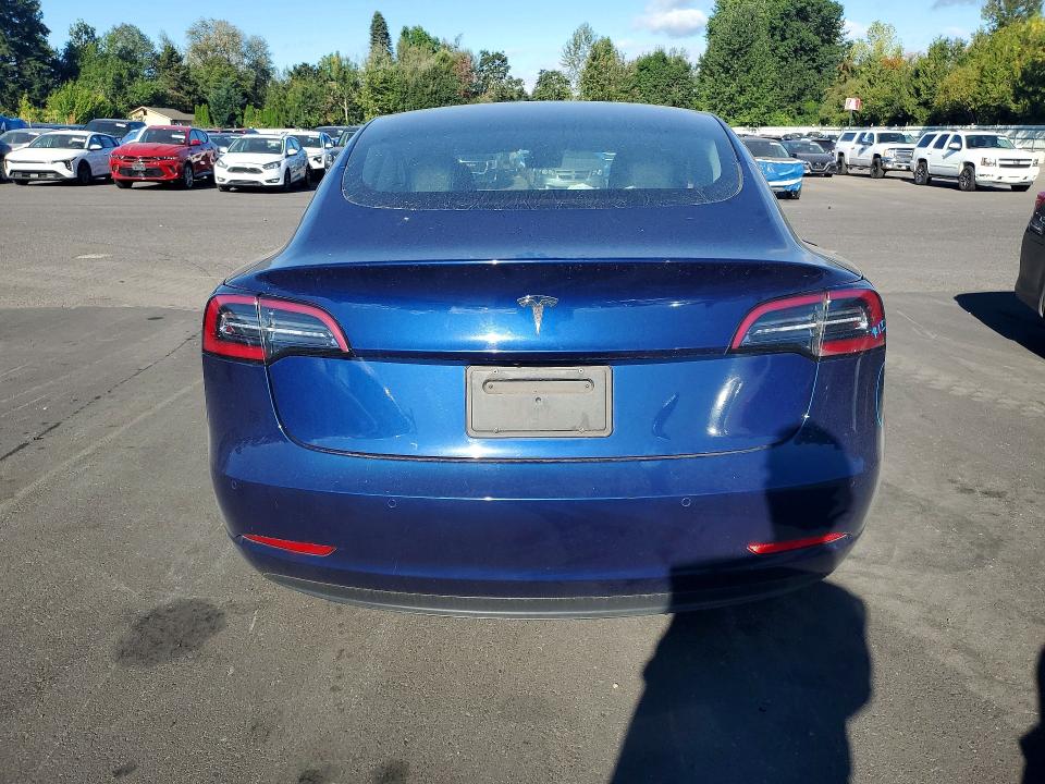 Foto 6 de la subasta – 2022 TESLA MODEL 3 con VIN 5YJ3E1EA8NF372300
