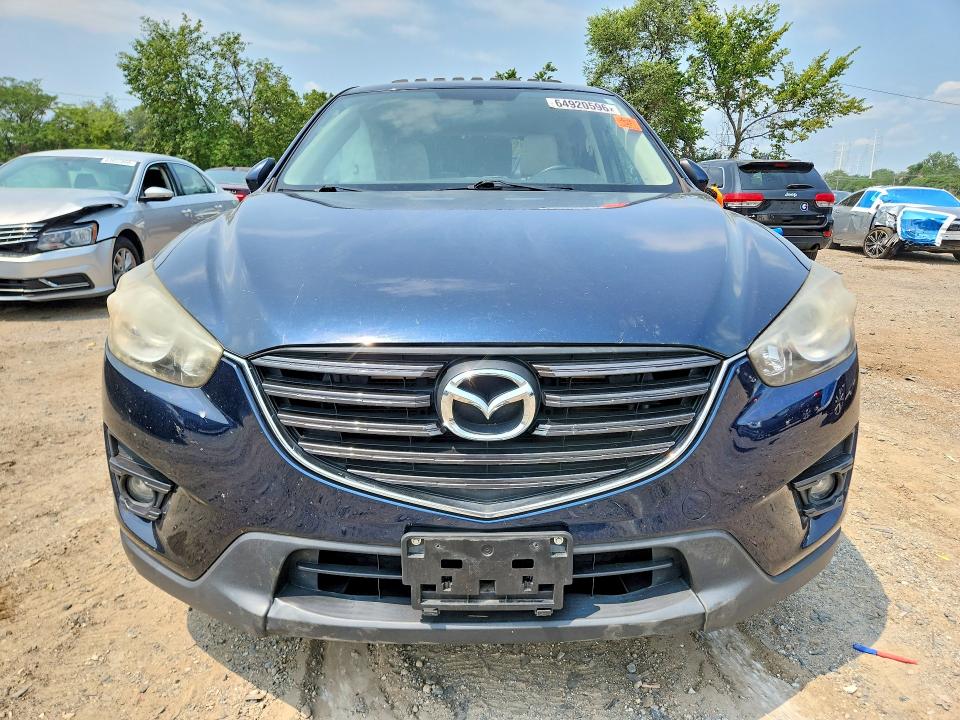Photo 5 from auction – 2016 MAZDA CX-5 with VIN JM3KE4CY3G0777633