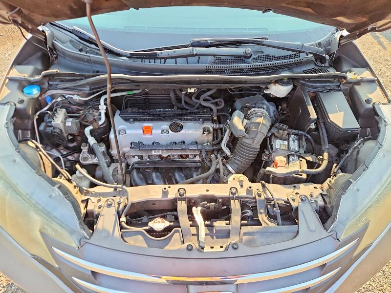 Photo 12 from auction – 2014 HONDA CR-V with VIN 5J6RM4H56EL000796