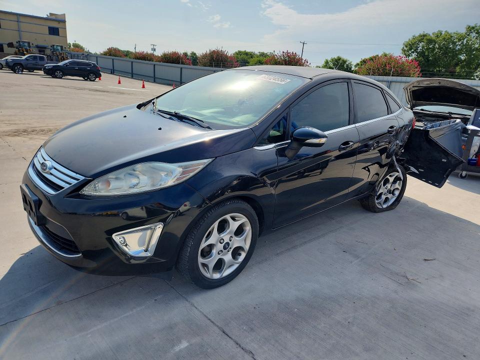 FORD FIESTA 2011 with VIN 3FADP4CJ3BM145273 - Photo from auction