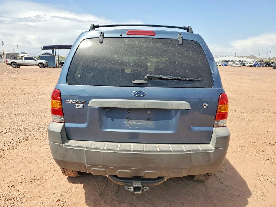 Photo 6 from auction – 2006 FORD ESCAPE with VIN 1FMCU031X6KA46854