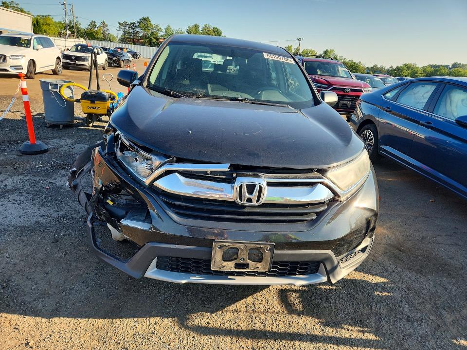 Photo 5 from auction – 2017 HONDA CR-V with VIN 5J6RW6H39HL008769