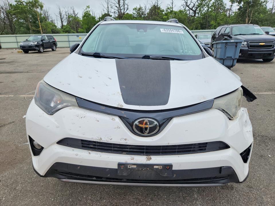 Photo 5 from auction – 2018 TOYOTA RAV4 with VIN 2T3RFREV1JW757131