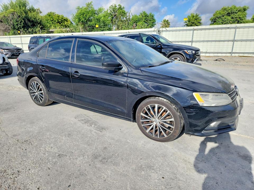 Photo 4 from auction – 2016 VOLKSWAGEN JETTA with VIN 3VWD17AJ1GM414231