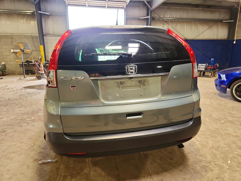 Photo 6 from auction – 2012 HONDA CR-V with VIN 5J6RM3H57CL010891
