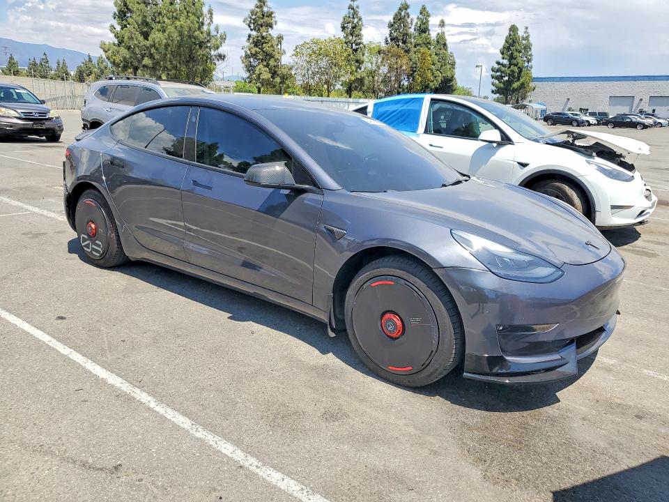 Photo 4 from auction – 2023 TESLA MODEL 3 with VIN 5YJ3E1EA4PF447769