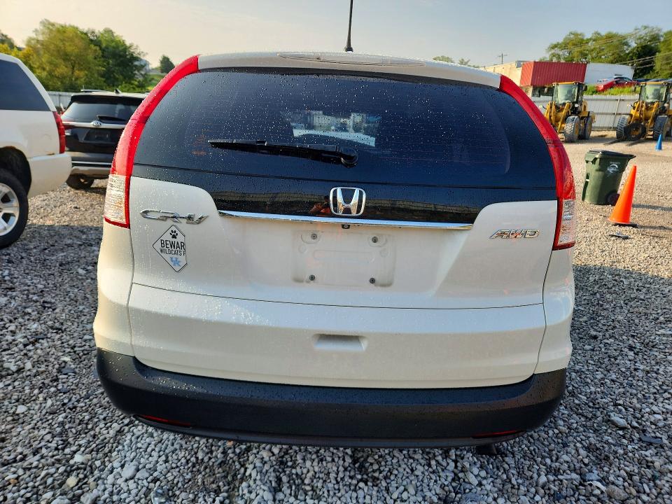 Photo 6 from auction – 2014 HONDA CR-V with VIN 5J6RM4H35EL102024