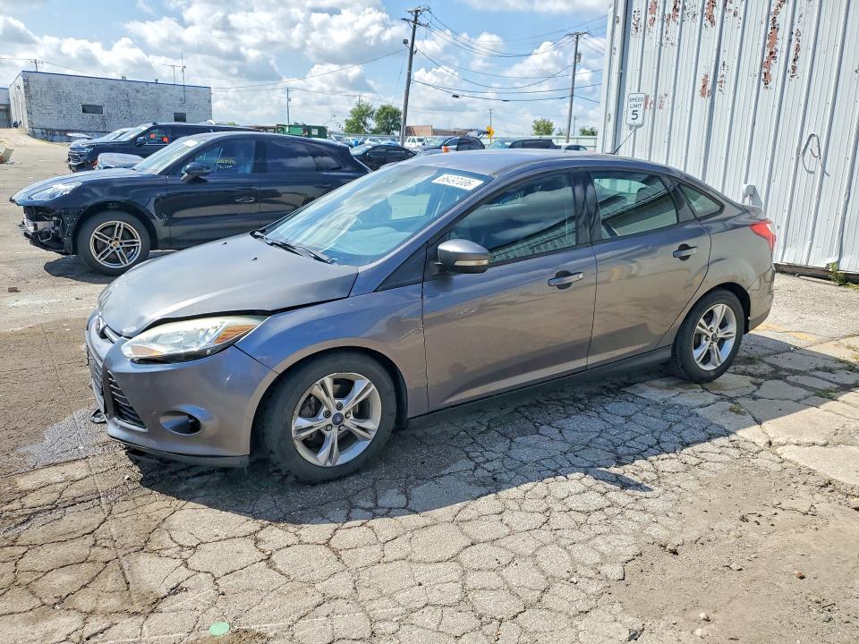 FORD FOCUS 2014 with VIN 1FADP3F29EL336863 - Photo from auction