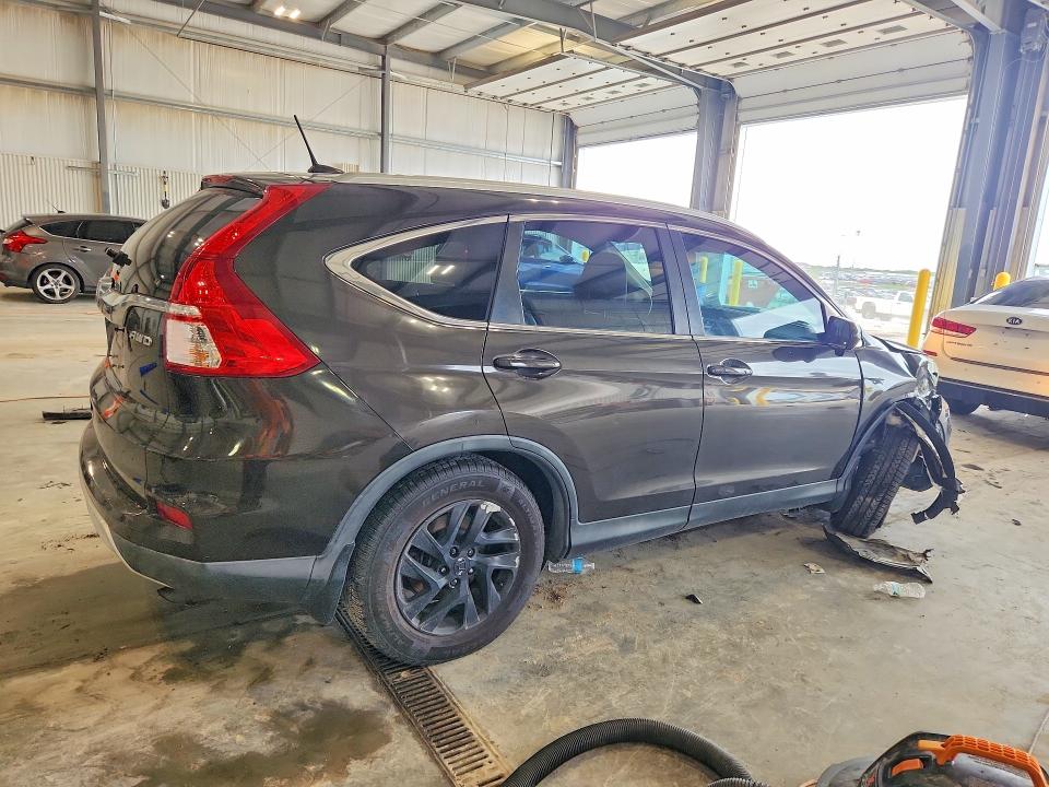 Photo 3 from auction – 2015 HONDA CR-V with VIN 2HKRM4H73FH625489