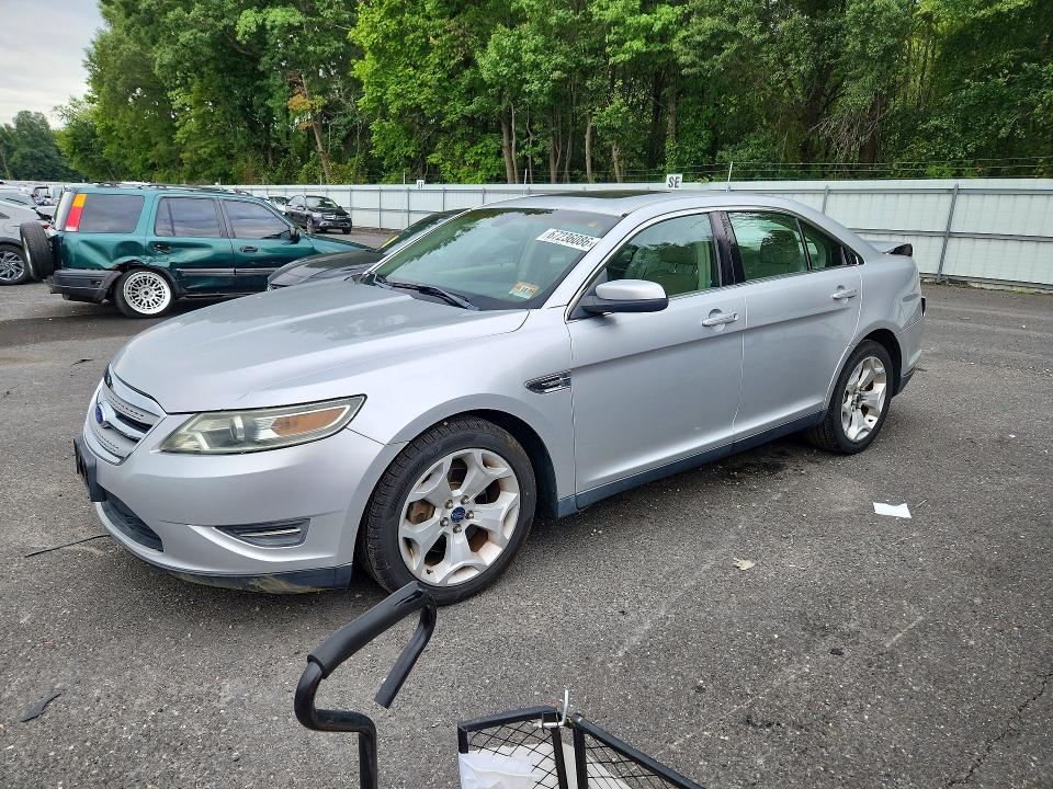 FORD TAURUS 2012 with VIN 1FAHP2EW1CG107213 - Photo from auction