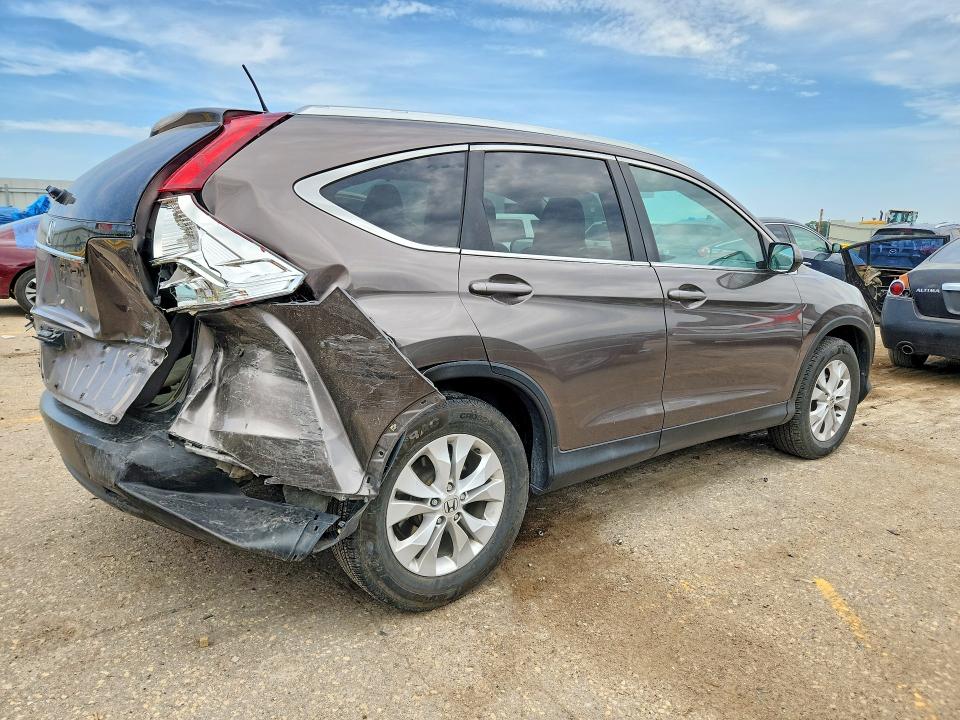 Photo 3 from auction – 2014 HONDA CR-V with VIN 2HKRM3H71EH548095