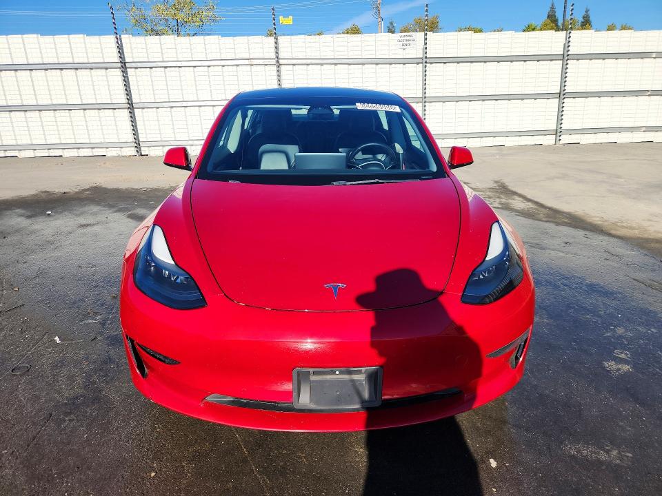 Photo 5 from auction – 2022 TESLA MODEL 3 with VIN 5YJ3E1EAXNF304628