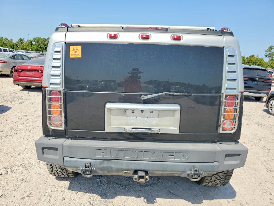 Фото 6 с аукциона – 2003 HUMMER H2 с VIN 5GRGN23U03H134649