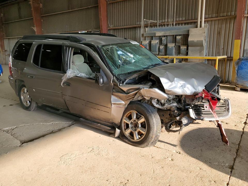Photo 4 from auction – 2005 GMC ENVOY with VIN 1GKES16S556140228