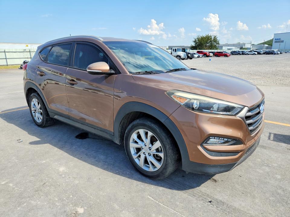 Photo 4 from auction – 2016 HYUNDAI TUCSON with VIN KM8J3CA29GU112937