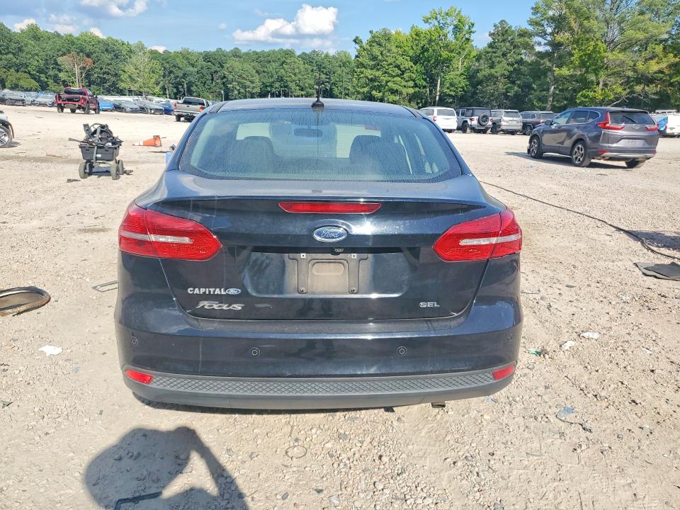 Photo 6 from auction – 2018 FORD FOCUS with VIN 1FADP3H24JL294481