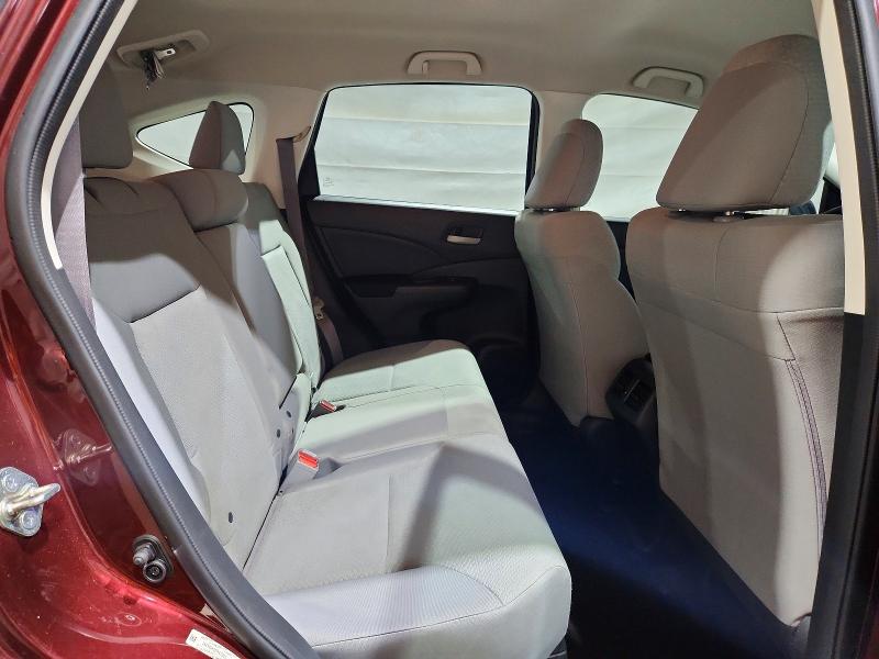 Photo 11 from auction – 2015 HONDA CR-V with VIN 2HKRM4H30FH610302